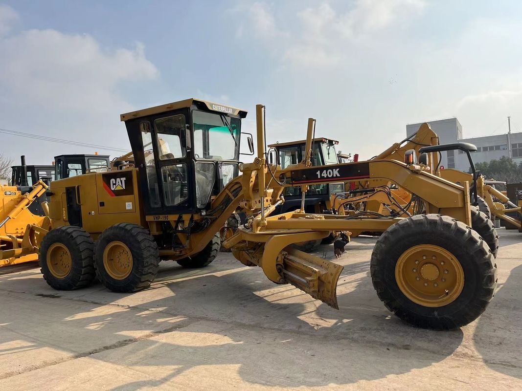 ব্যবহৃত Caterpillar মোটর গ্রেডার 140K স্টক সেকেন্ড হ্যান্ড বিড়াল 140 মোটর গ্রেডার