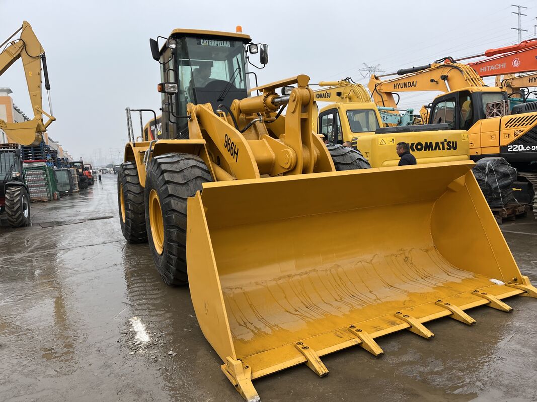 কঠিন শিল্প পরিবেশে পারফরম্যান্স প্রদানকারী উচ্চ ব্রেকআউট ফোর্স এবং শক্তিশালী পাওয়ারট্রেন সহ ব্যবহৃত CAT 966H হুইল লোডার